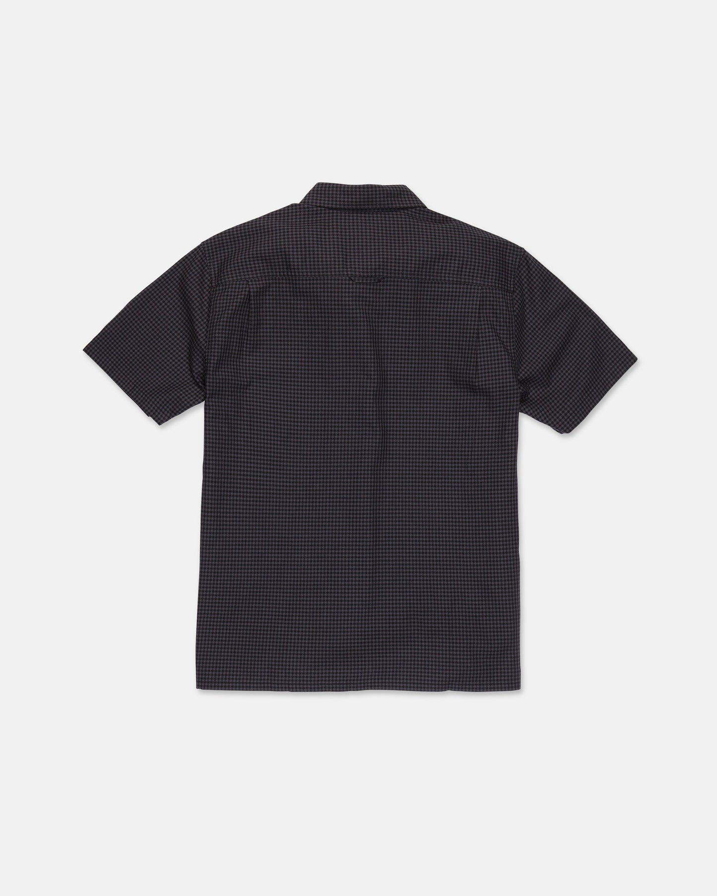 A Volcom Men's Glasnow Short Sleeve Shirt, featuring a small yarn-dyed checkered pattern in dark colors and made from cotton, is laid flat with the back side visible against a white background.