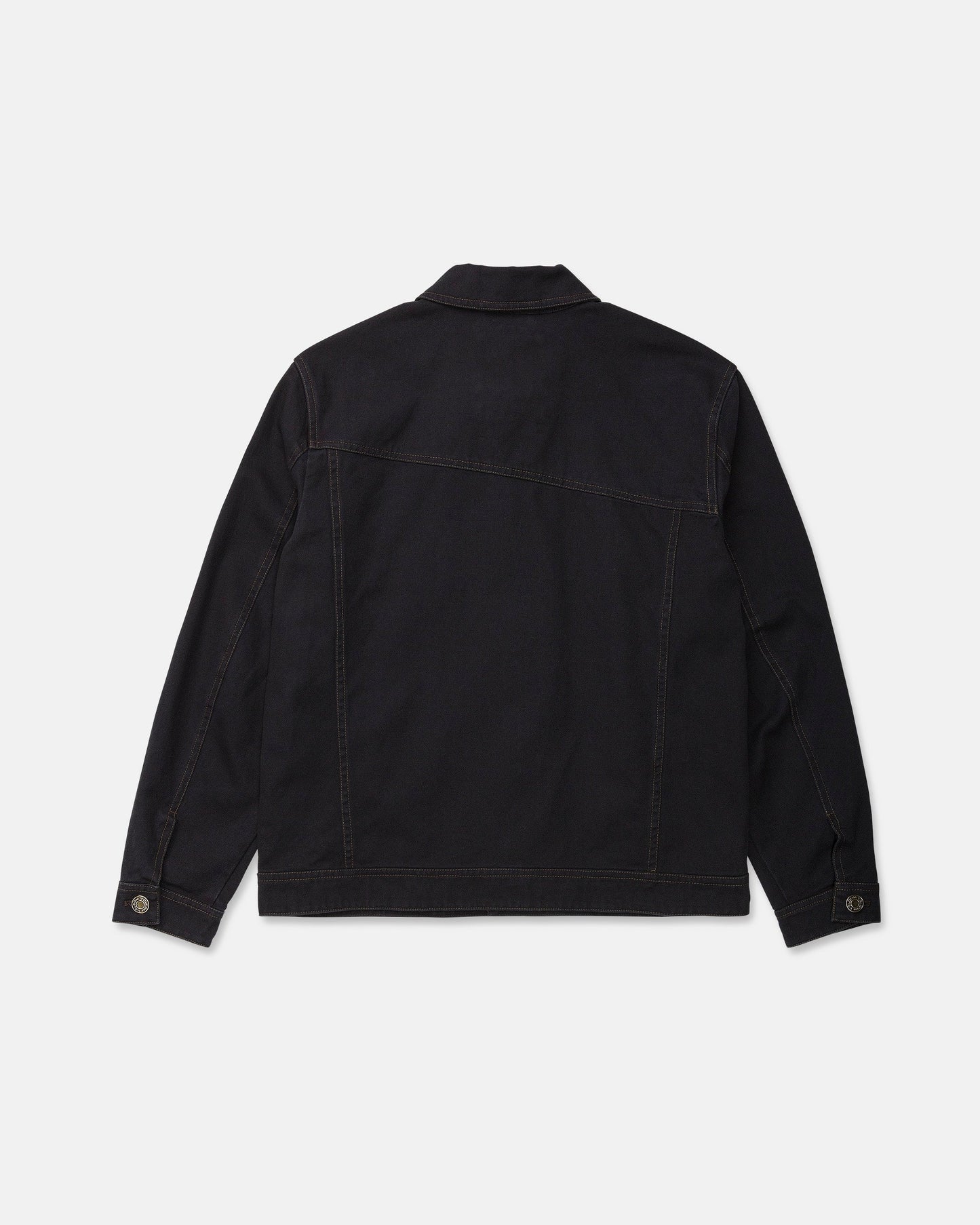 The Men's Slakers Jacket by Volcom is pictured from the back in black denim, showcasing long sleeves, brown stitching, a straight hem, and buttoned cuffs. Designed as a lightweight jacket, it is set against a plain white background.