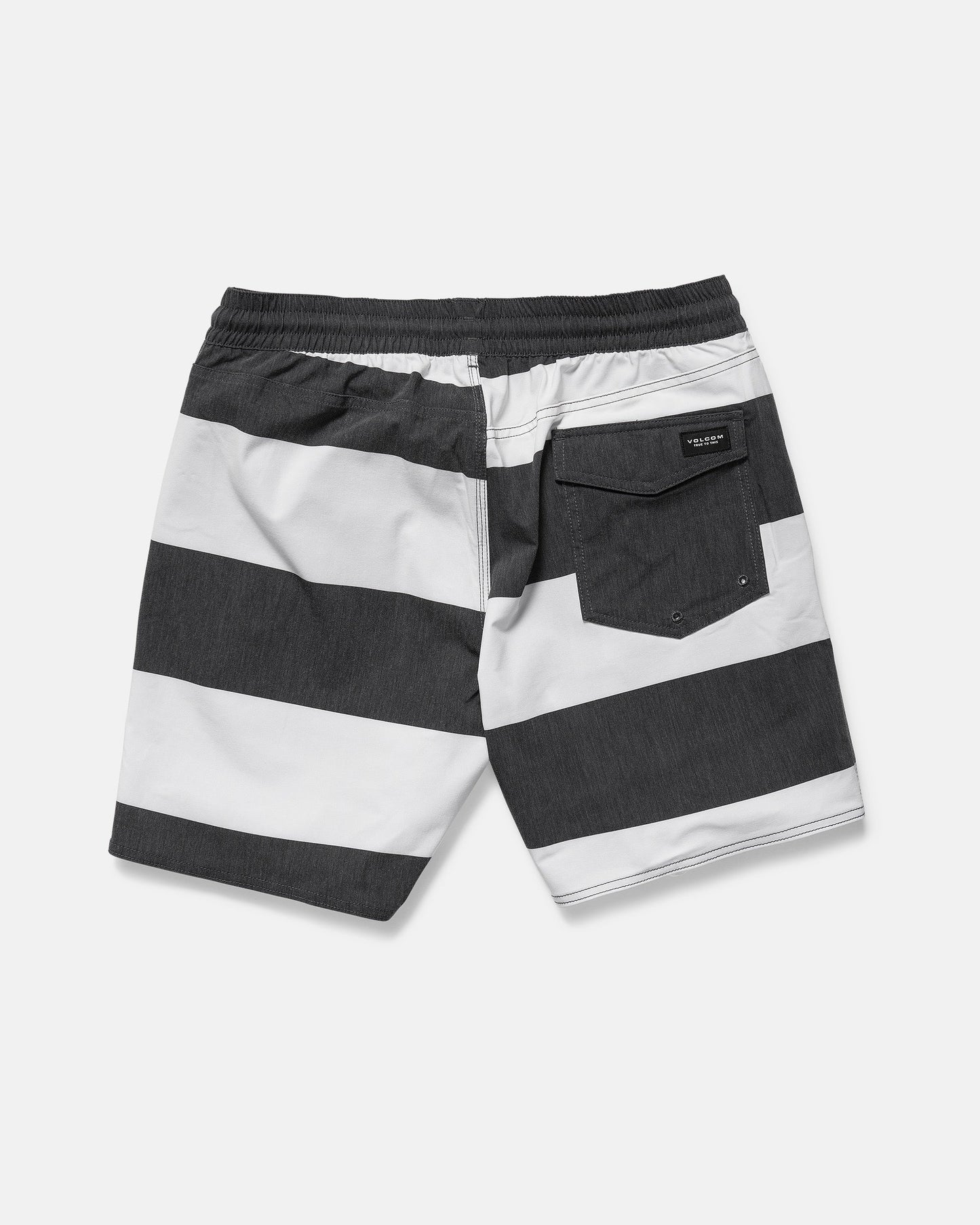 Back view of Volcom Men's Psyche Cotton 17" Trunk in black and white horizontal stripes, featuring a 17-inch outseam, elastic waistband, and a single flap back pocket on the right.