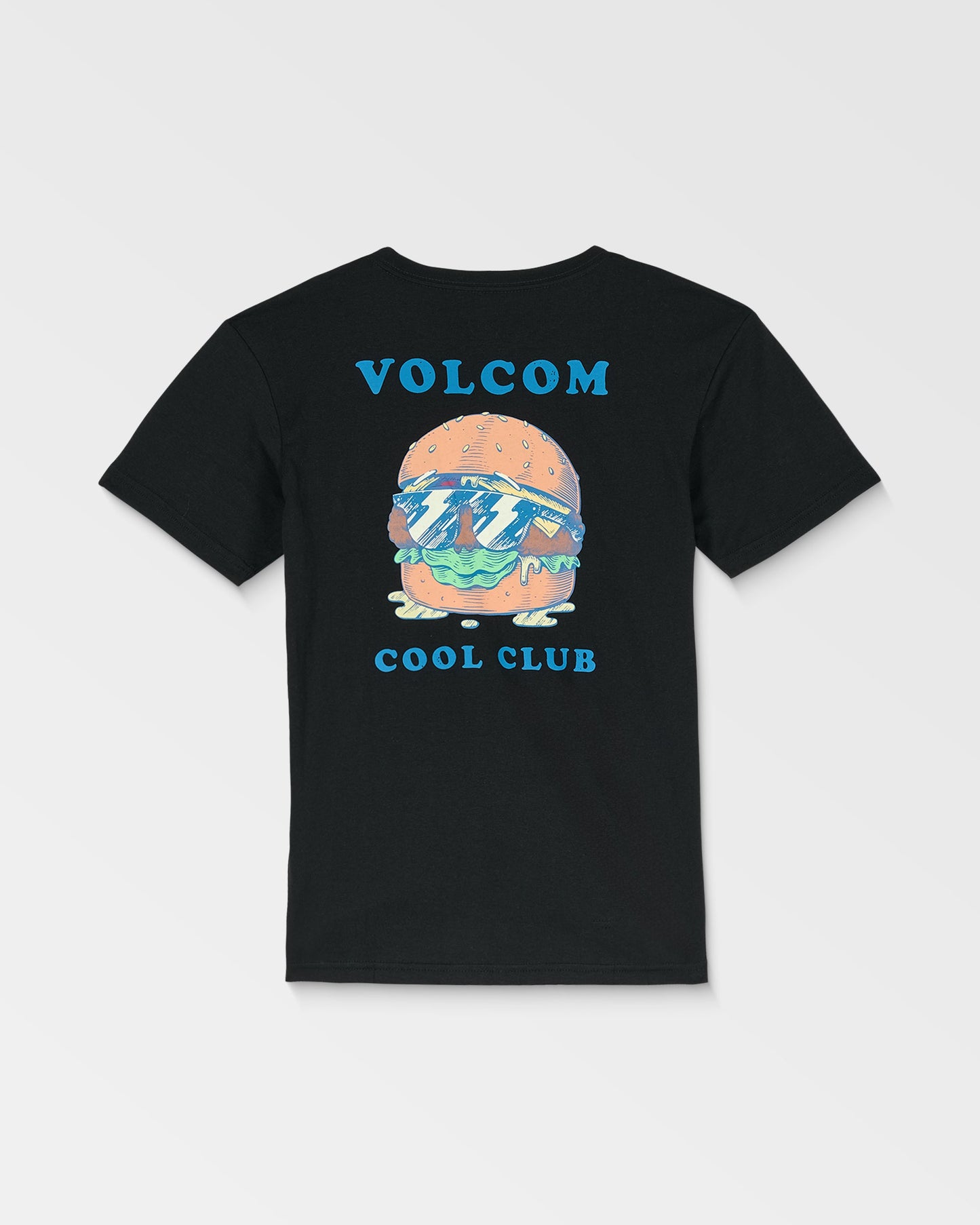 The Volcom Kids' Burgstone Pocket Tee is a black organic cotton shirt with a cartoon hamburger wearing sunglasses on the pocket. The back has VOLCOM in blue above and COOL CLUB below the burger graphic.