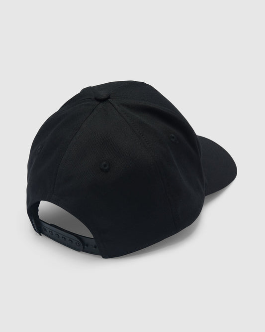 The Men's Embossed Stone Adjustable Hat by Volcom is shown from the back at an angle, featuring a black FLEXFIT A-frame design with an adjustable snapback strap and visible crown stitching against a plain light background.