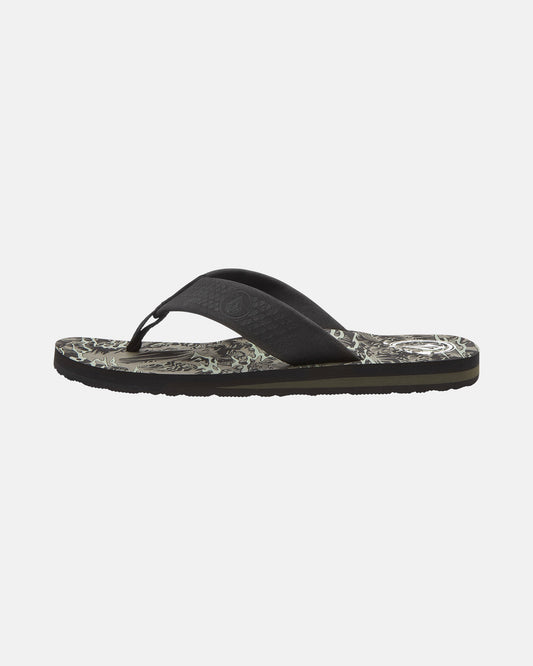 The Volcom Men's Daycation 2 Hawaii Sandal is shown in black with a patterned sole and textured straps, displayed in a side profile view on a plain white background.