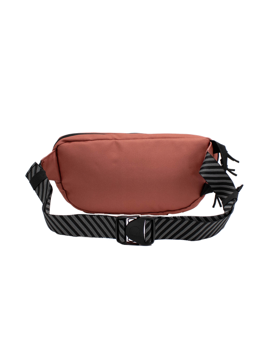 The Volcom Men's Mini Dos Waist Pack, featuring a reddish-brown design with a black zipper and an adjustable black strap adorned with diagonal gray stripes, is displayed on a plain white background.