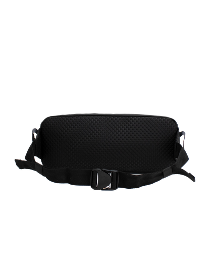 The Men's Venture Light Sling Pack by Volcom, shown in black against a plain white background, is a lightweight sling bag featuring a textured back panel and an adjustable strap with a plastic buckle.