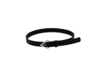 The Volcom Women's Stoned Forever black leather belt, featuring a distinctive silver, stone-shaped buckle, is coiled in a circle on a plain white background.