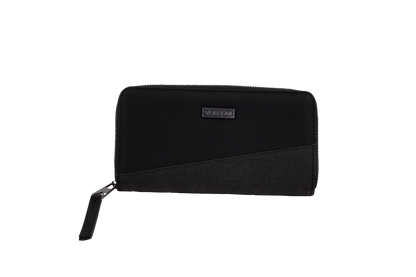 A black zippered Volcom Women's Palmcation wallet, checkbook-sized and adorned with a small rectangular metal logo plate on the front, is displayed against a plain white background—an ideal everyday companion for sleek organization.