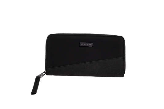 A black zippered Volcom Women's Palmcation wallet, checkbook-sized and adorned with a small rectangular metal logo plate on the front, is displayed against a plain white background—an ideal everyday companion for sleek organization.