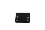 A Volcom Women's Studette Card Wallet in black, featuring a slim design with three card slots and four silver pyramid studs—two on each side—displayed against a plain white background.