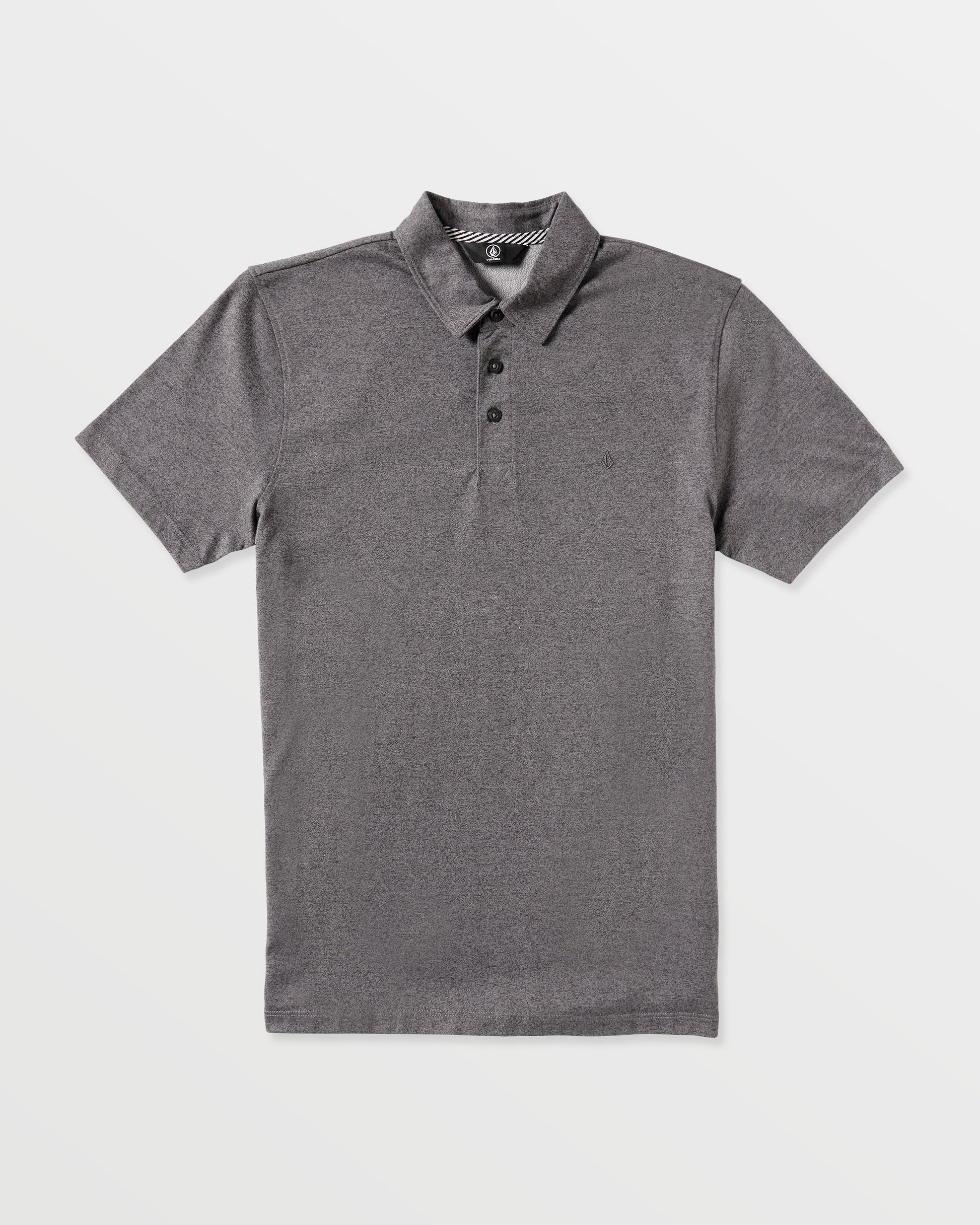 The Volcom Men's Wowzer Polo Short Sleeve Shirt features a classic collar and three black buttons in plain gray, offering a modern fit perfect for business casual style.