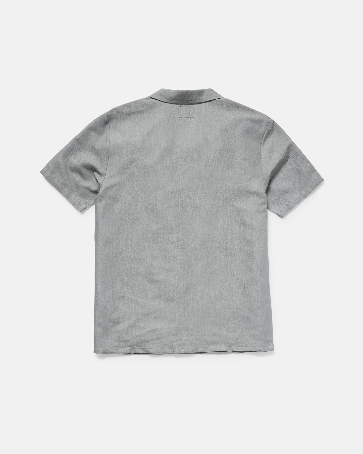 The Men's Otis Stone Short Sleeve Tee by Volcom, featuring a boxy fit and light gray color, is displayed from the back on a plain white background.