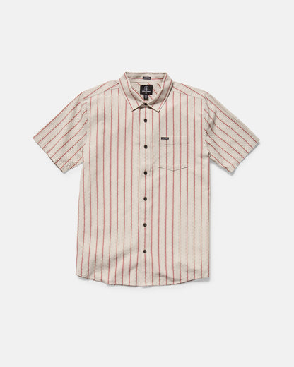 The Volcom Men's Sato Stripe Short Sleeve Tee features a white base with red vertical stripes, a left chest pocket, black front buttons, and a classic fit in soft cotton slub.