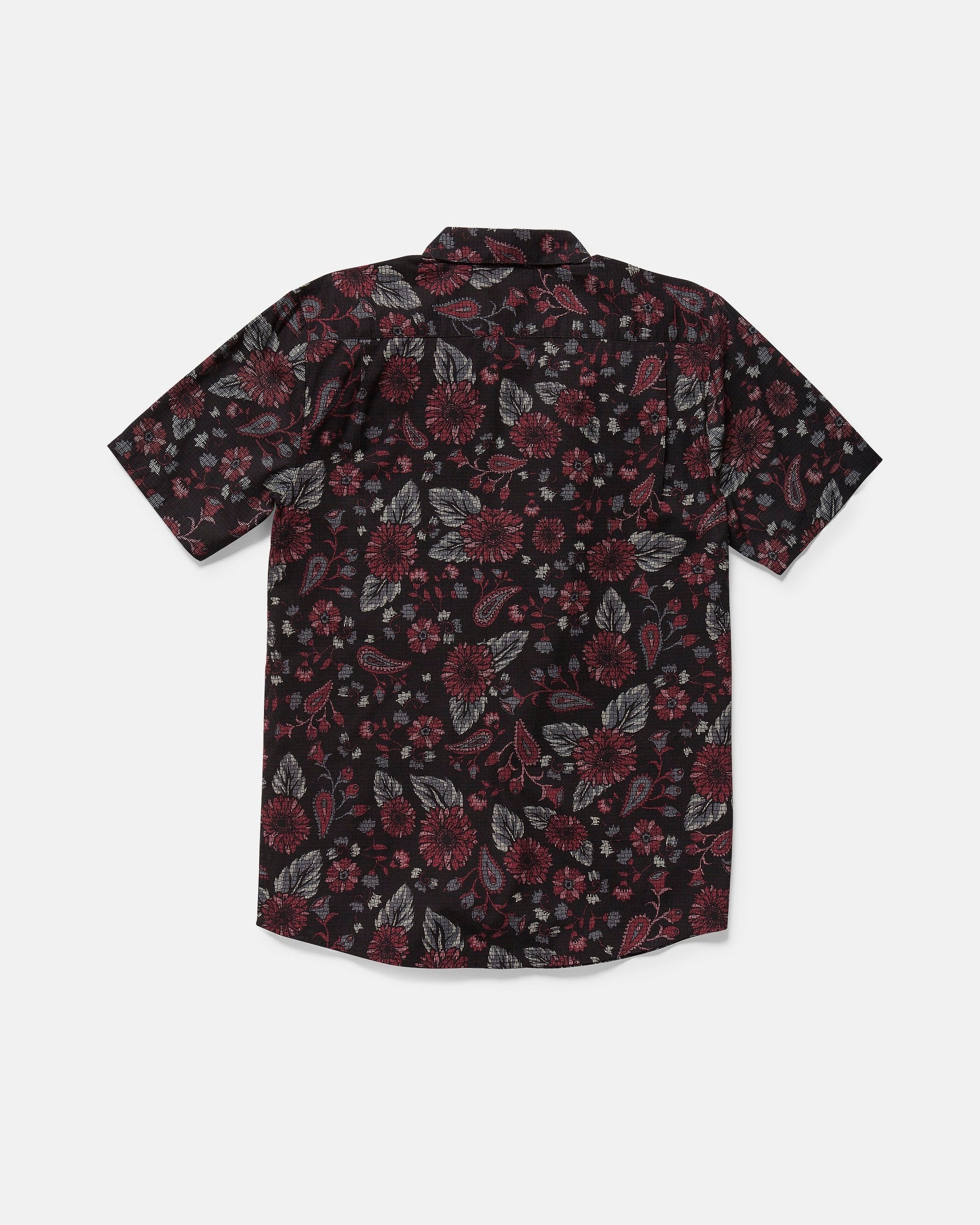 The Volcom Men's Scaler Stone Woven Short Sleeve Shirt features a black base with an all-over red, gray, and white floral pattern. This classic fit button-up is shown laid flat with the back side facing up.