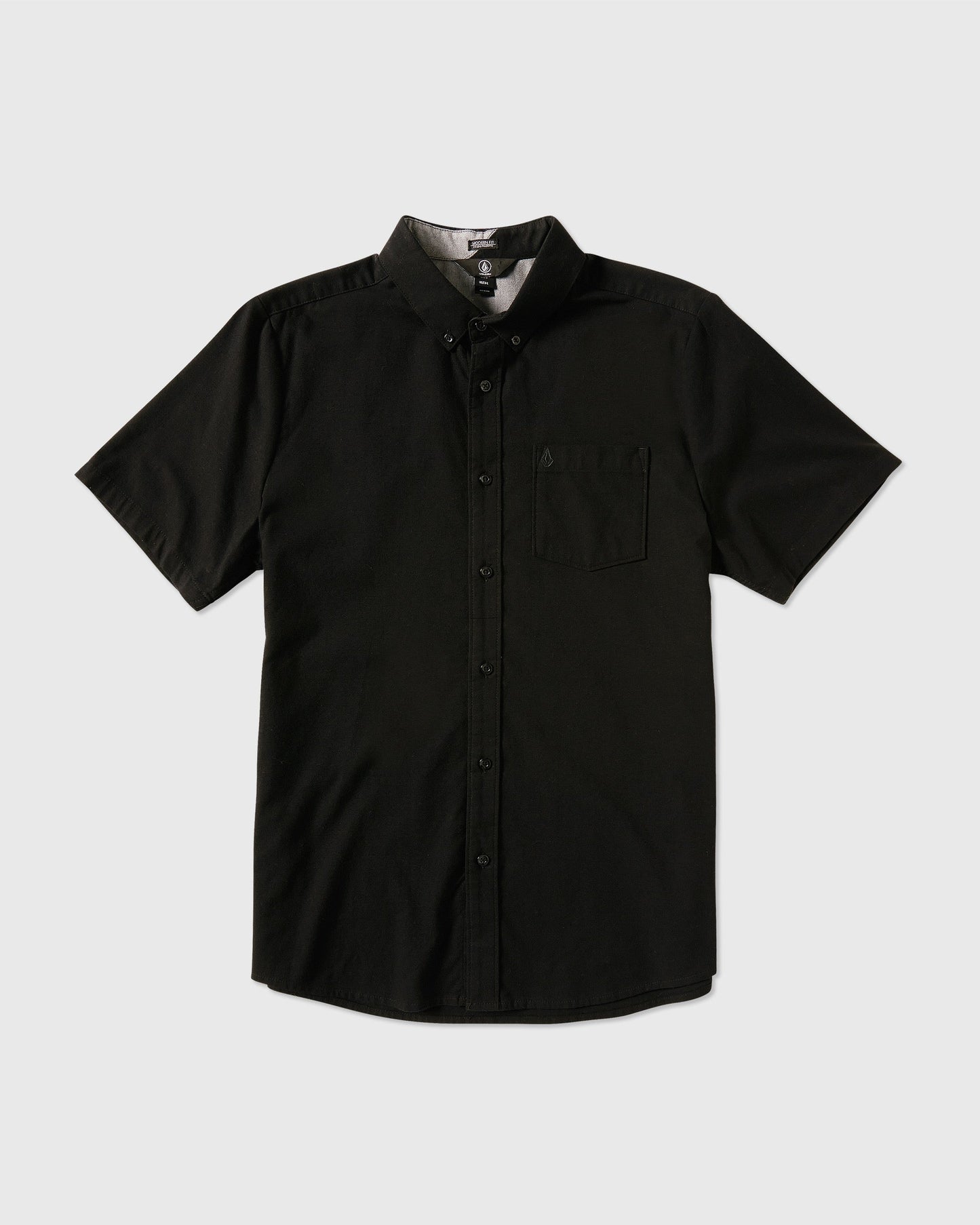 The Volcom Men's Everett Oxford Short Sleeve is a black, slim-fit shirt with a collar and single chest pocket, displayed flat on a white background.