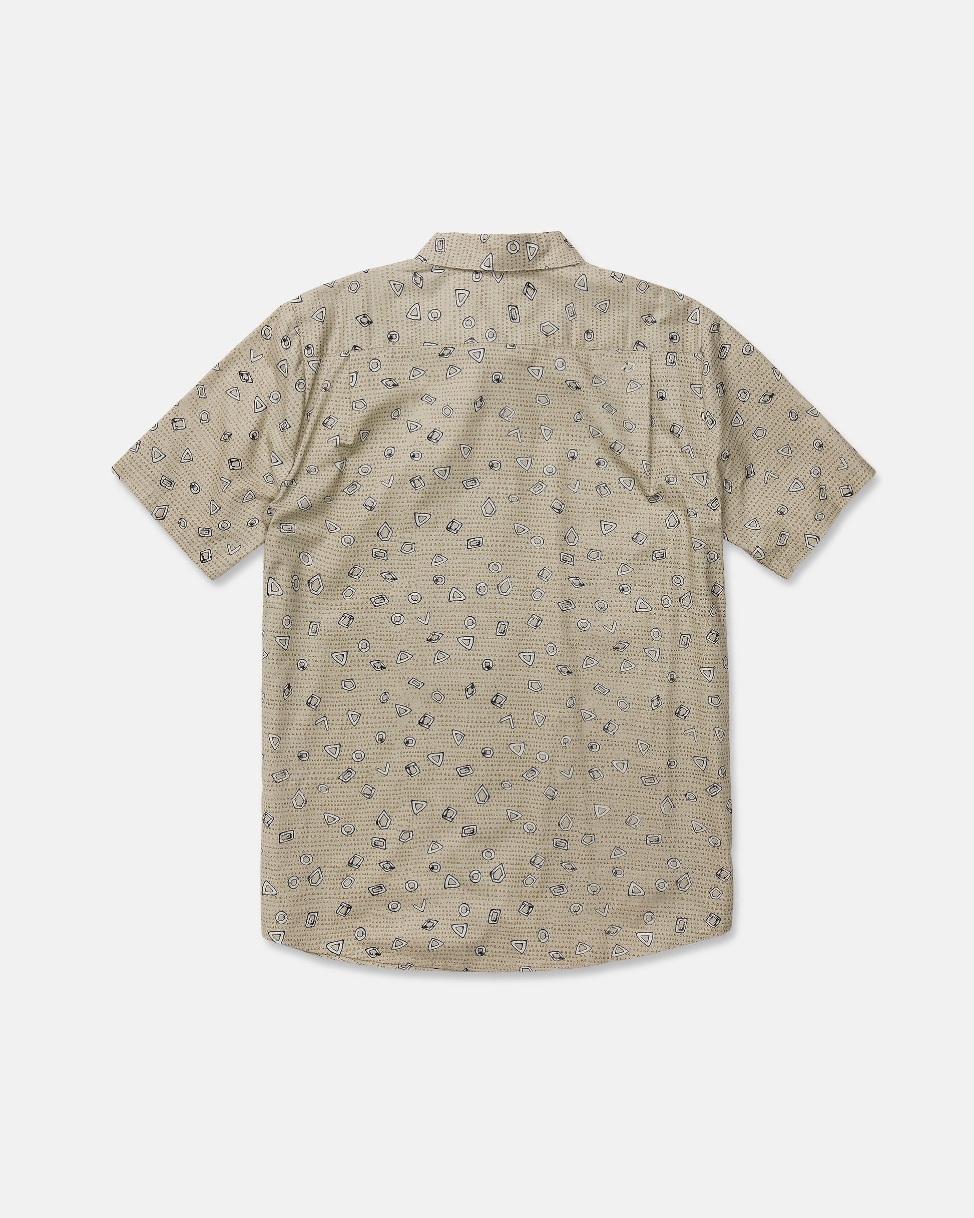 A beige Men's Scaler Stone Short Sleeve Shirt by Volcom, featuring a classic fit and subtle dotted pattern with small black illustrated designs, made from a soft cotton-viscose blend and displayed from the back against a plain white background.