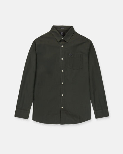 The Men's Veeco Oxford Long Sleeve Shirt by Volcom, shown in Climbing Ivy green, features a classic fit with a collar and single chest pocket, crafted from soft micro suede and displayed on a white background.