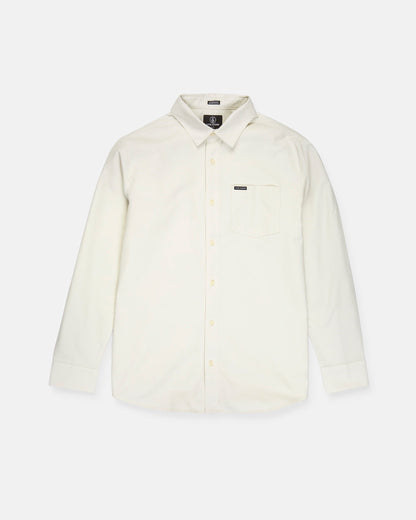 A Volcom Men's Veeco Oxford Long Sleeve Shirt in plain off-white, featuring a classic fit with a pointed collar and single chest pocket, is laid flat on a white background.