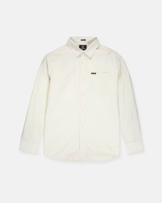 A Volcom Men's Veeco Oxford Long Sleeve Shirt in plain off-white, featuring a classic fit with a pointed collar and single chest pocket, is laid flat on a white background.