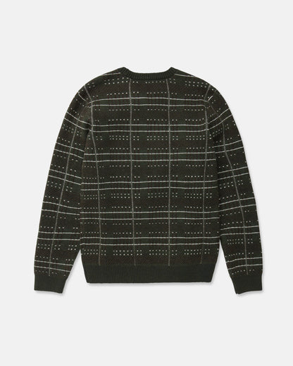 The Volcom Men's Stone Optix Sweater is a dark green slim fit crew neck sweater featuring a white and light green grid pattern with small dotted accents. Shown laid flat with the back facing up, this modern design offers a distinctive look.