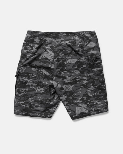 The Volcom Men's 4th Of July Preemo Mod boardshorts in black and gray camo, featuring Cinch Fly Technology and side pockets, are laid flat on a white background.