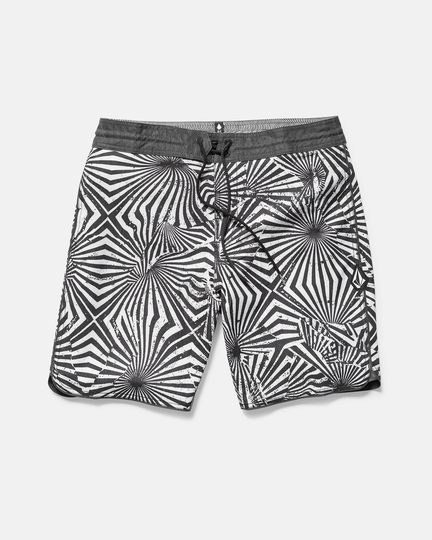 Black and white patterned shorts on a light gray background