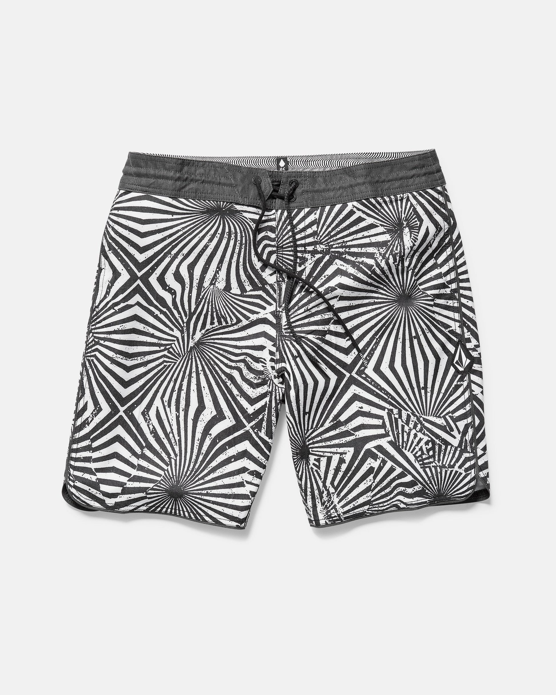 Black and white patterned shorts on a light gray background