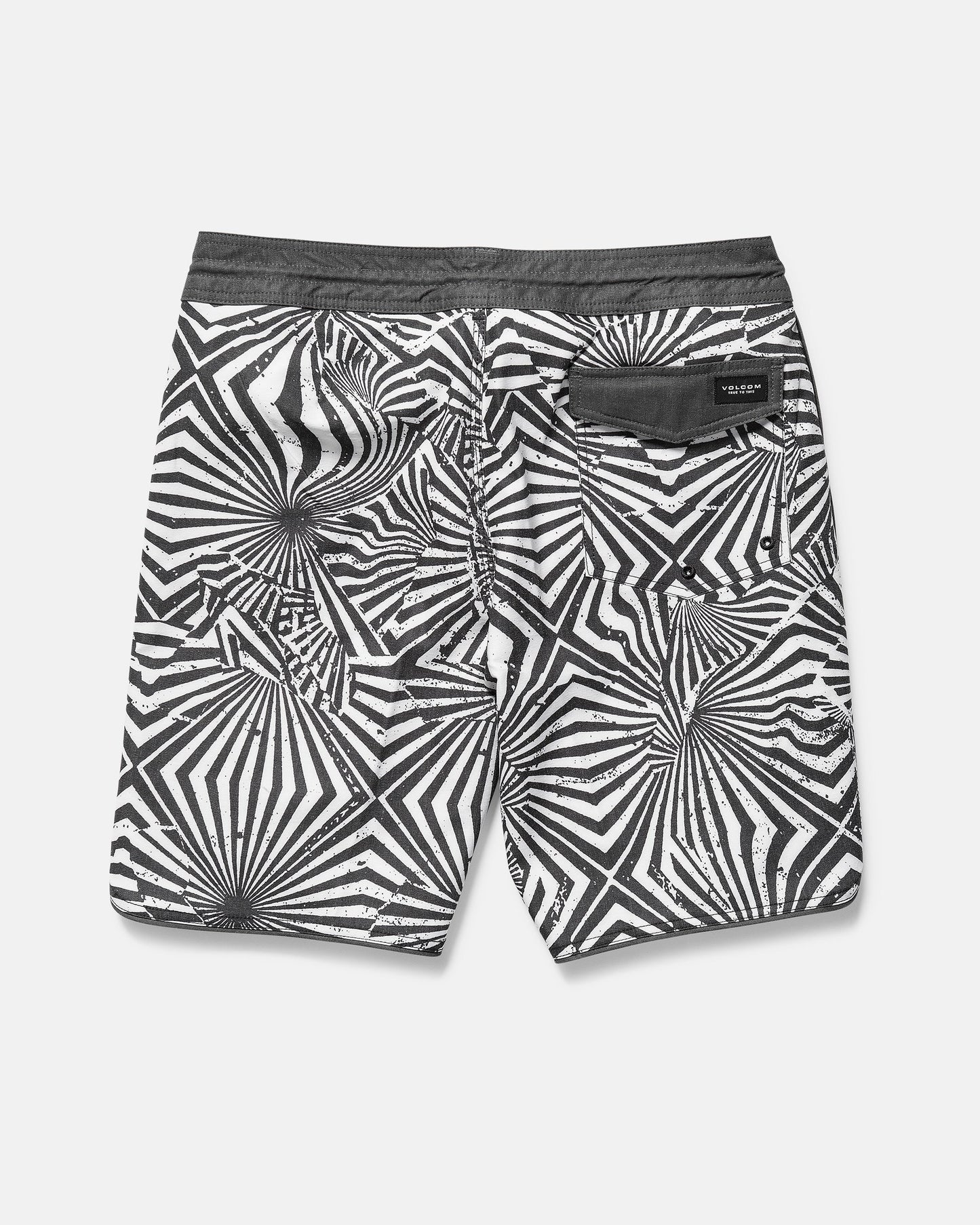 Black and white patterned shorts on a gray background