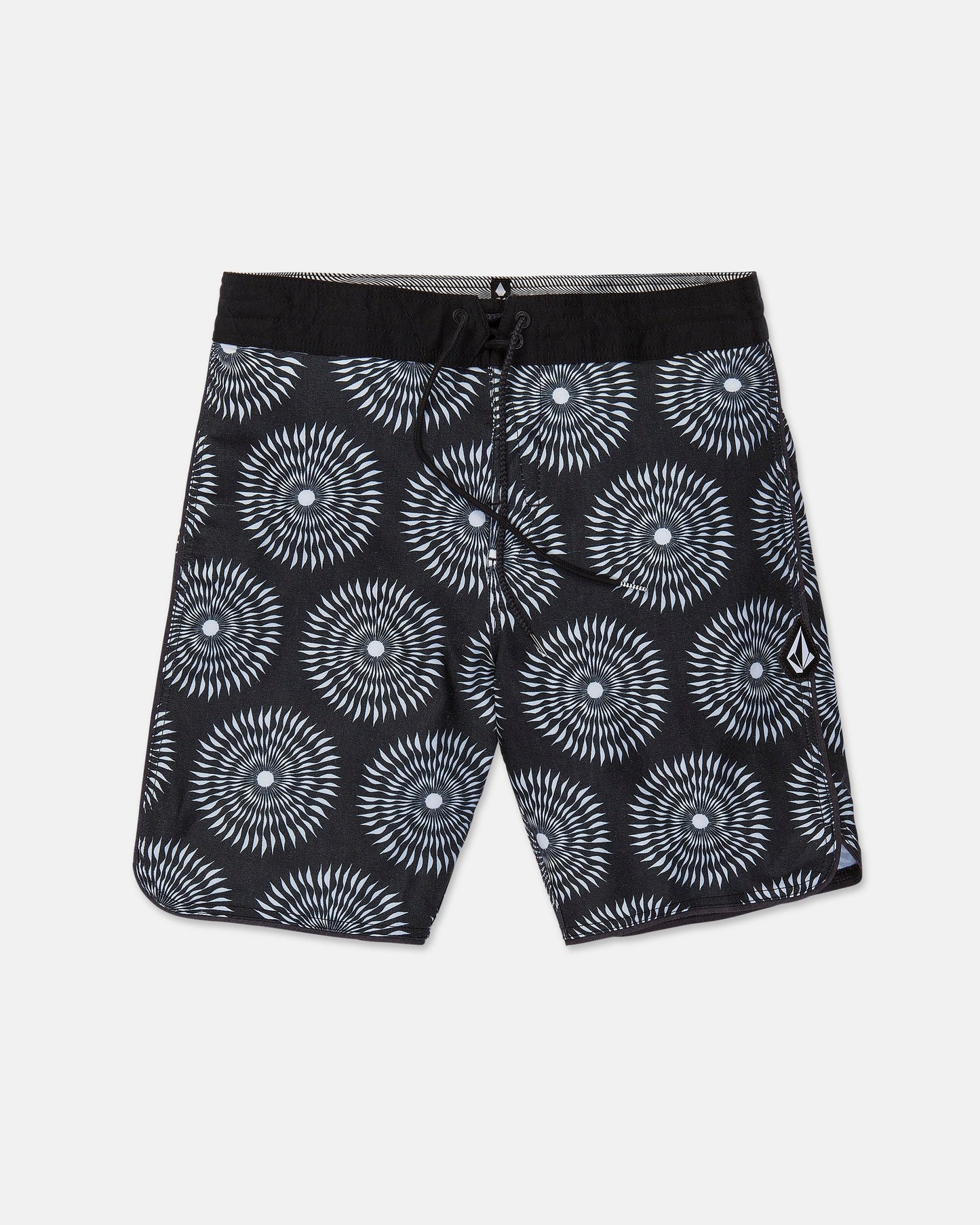 Men's Barnacle Stoney board shorts by Volcom, featuring a black base with a white and gray circular geometric pattern, a black drawstring waistband, and a small white Volcom logo on the left leg. Made from a comfortable hemp-cotton blend, these shorts are displayed flat on a white background.