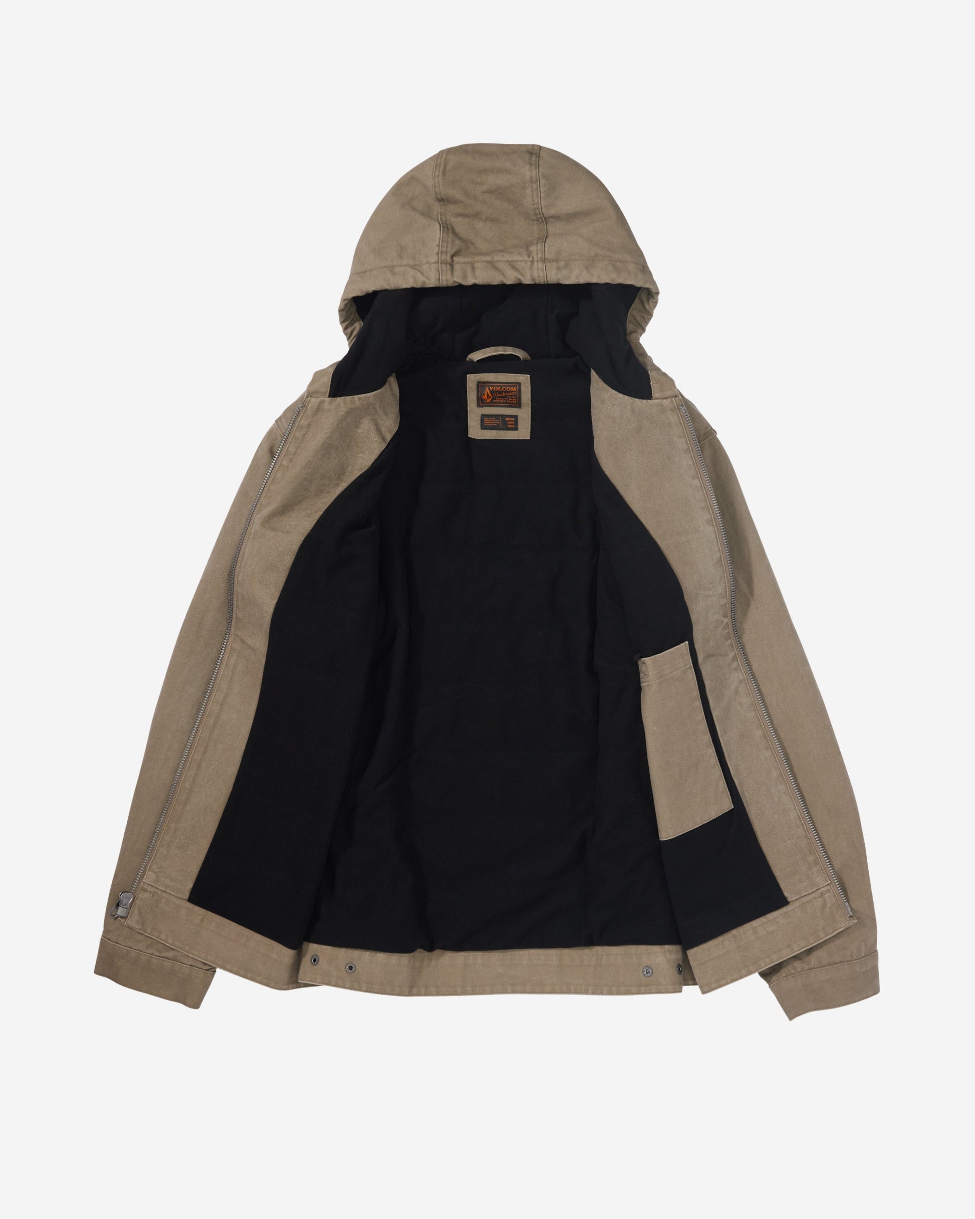 The Volcom Men's Freshdust Workwear Jacket is tan with a hood, large hand and chest pockets, an inner left pocket, dark lining, a zip front with metal snap buttons, and a Volcom Workwear label near the collar.