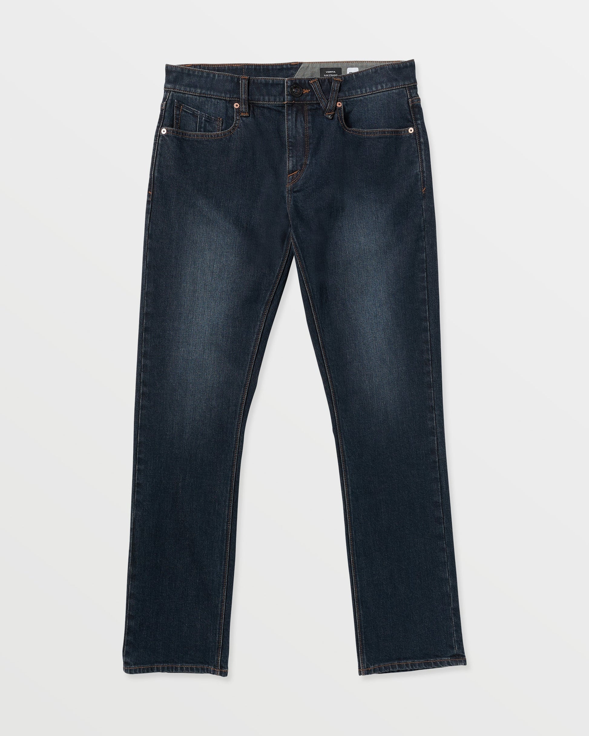 The Volcom Men's Vorta Denim features dark blue straight-leg jeans with classic five-pocket styling, visible stitching, and a button closure, shown laid flat on a white background.