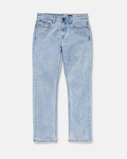 Volcom Men's Solver Denim Pants in light blue, featuring a straight leg, classic five-pocket design, and button-zip fly, displayed flat on a white background.