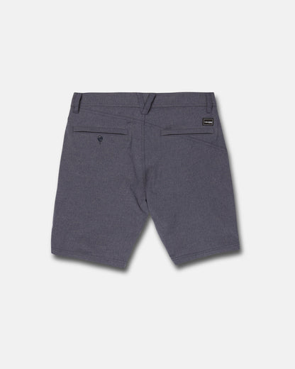 Back view of Volcom Men's Frickin Cross Shred Static Shorts in heathered charcoal with belt loops, two back pockets—one buttoned—and a small black label above the right pocket, shown on a plain light gray background.
