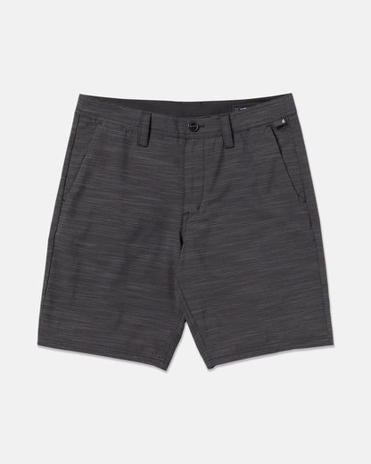 A pair of Volcom Men's Slub Frickin Cross Shred 20" Hybrid Shorts in dark gray with subtle horizontal stripes, 4-way stretch, side pockets, belt loops, and button waist, shown on a plain white background.