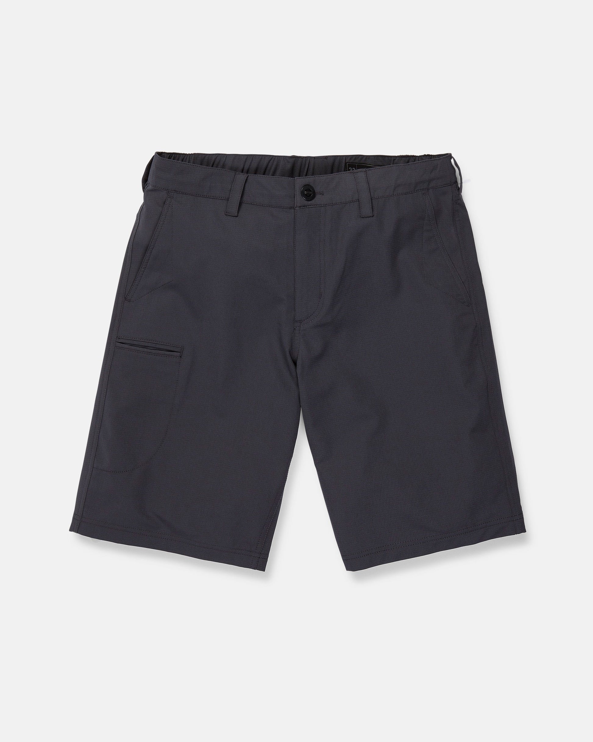 Men's Venture Stone Hybrid Shorts by Volcom in dark gray, made from recycled-poly fabric. These knee-length shorts feature a waistband with belt loops, a front button closure, and an angled side pocket on the left leg. Shown on a plain white background.