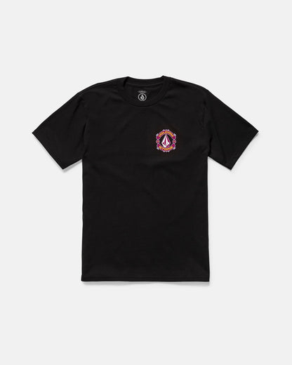 The Volcom Men's Freekick Short Sleeve Tee in black features a classic fit, breathable cotton, and a small colorful crest with geometric logo graphic on the left chest, shown on a plain white background.