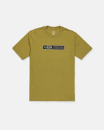 Introducing the Men's Dual Euro Short Sleeve Tee by Volcom—this olive green t-shirt features a round neck and is expertly crafted from premium ring-spun cotton for outstanding comfort. The chest is adorned with a rectangular black patch displaying "VOLCOM" in white distressed lettering, lending a vintage logo feel. Presented laid flat against a white background.