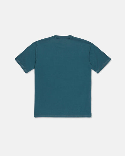 The Volcom Men's Crassy Short Sleeve Tee in teal is displayed laid flat with the back side facing up against a white background. This loose fit premium cotton t-shirt features short sleeves for comfort and versatility.