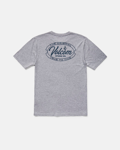 The Volcom Men's Garaged Short Sleeve Tee features a modern fit, heather gray fabric, a bold navy Volcom Stone Co. logo, and "The Original, True to This" text printed on the upper back.