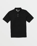 The Volcom Kids' Wowzer Polo Short Sleeve Tee is a black, modern fit collared shirt with three white buttons, made from a soft cotton-poly blend and shown laid flat on a white background.