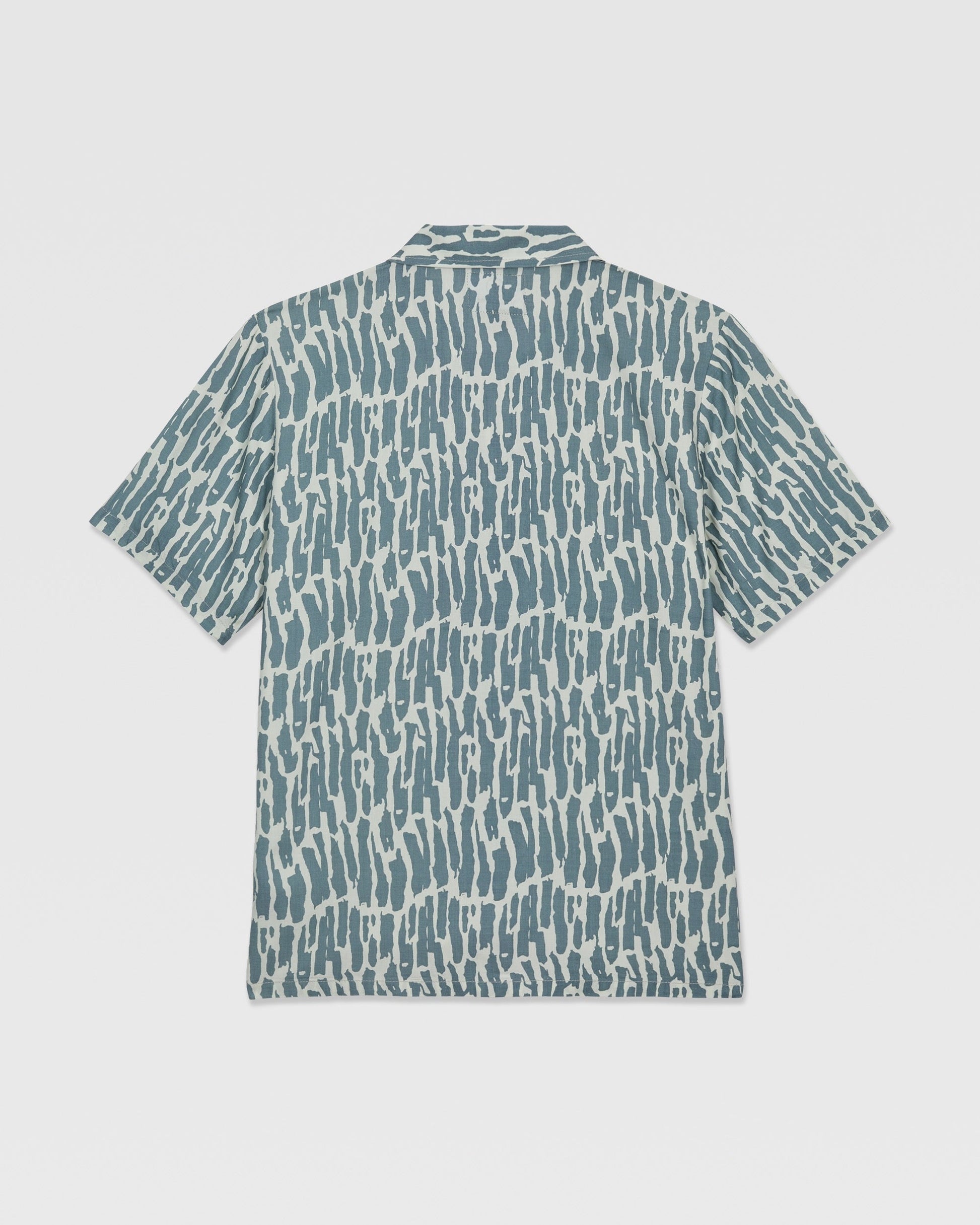 The Volcom Kids' Boldstone Short Sleeve Tee features a blue and white abstract brushstroke pattern, shown flat from the back.