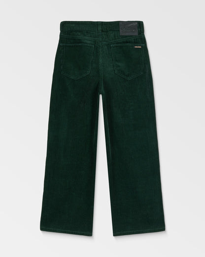 Kids' Big Boys' Billow Cord Pants by Volcom in dark green, shown laid flat from the back with a loose tapered fit, wide legs, two back pockets, and a black brand label on the waistband against a plain light gray background.