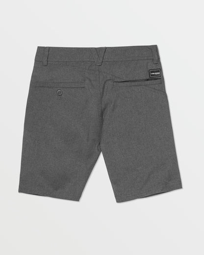 The Volcom Kids' Frickin Cross Shred Static Shorts in gray are shown from the back, featuring two rear pockets (one with a button), a black Volcom label above the right pocket, and made with recycled polyester for durability and stretch.