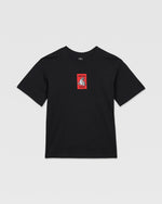 The Volcom Kids' Rockout Short Sleeve Tee is a relaxed fit black boys’ tee featuring a small red rectangle on the chest with a white unicorn and “Unicorn Store” text.
