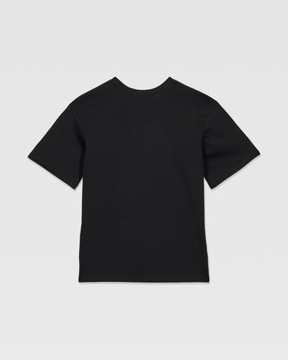 The Volcom Kids' Rockout Short Sleeve Tee, a relaxed fit black boys' t-shirt, is shown laid flat with the back facing up against a white background.