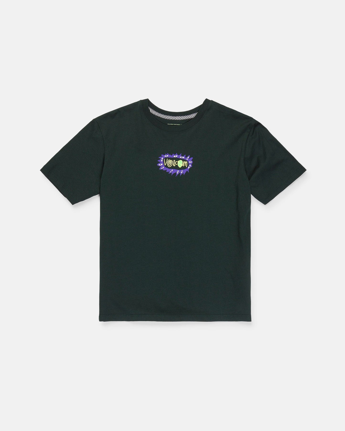 A black Boy's Featured Artist Ozzy 2 Short Sleeve Tee by Volcom, featuring a small, colorful "Venom" comic-style graphic with a jagged burst design on the left chest. Made from premium ring spun cotton for comfort and durability, this classic fit shirt is shown laid flat on a white background.