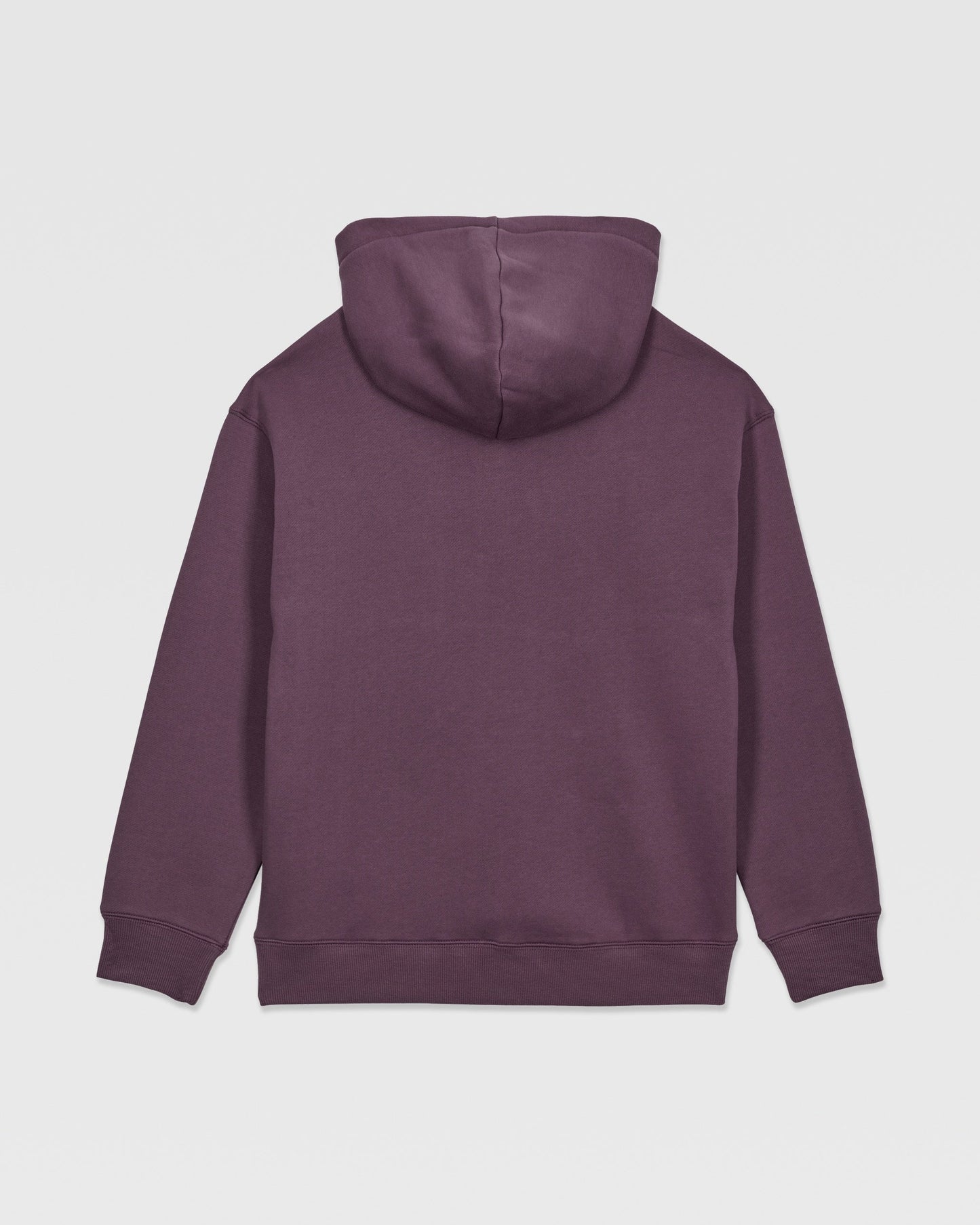 The Volcom Kids' Watanite Pullover is a plain, dark purple hoodie for boys, shown from the back. It features heavyweight fleece, a hood, long sleeves, and ribbed cuffs and waistband with no visible logos or designs.