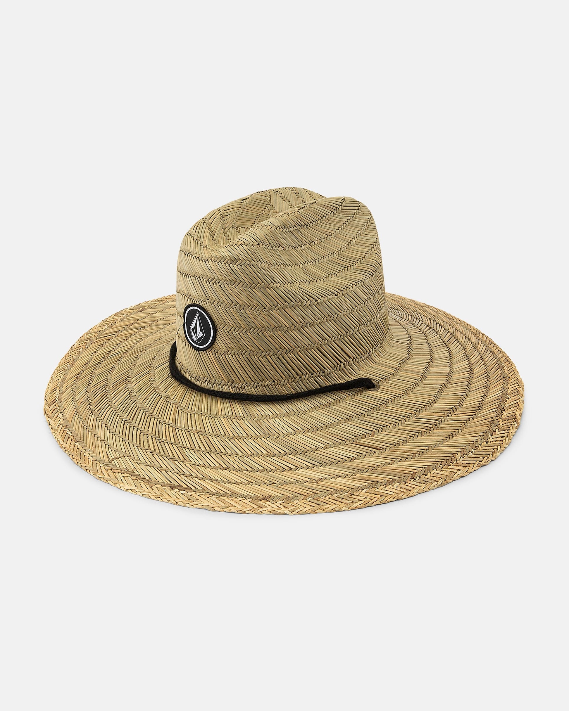 The Volcom Men's Quarter Straw Hat has a wide brim, a circular woven pattern, a front Stone logo patch, and an adjustable drawcord chin strap, shown on a white background.