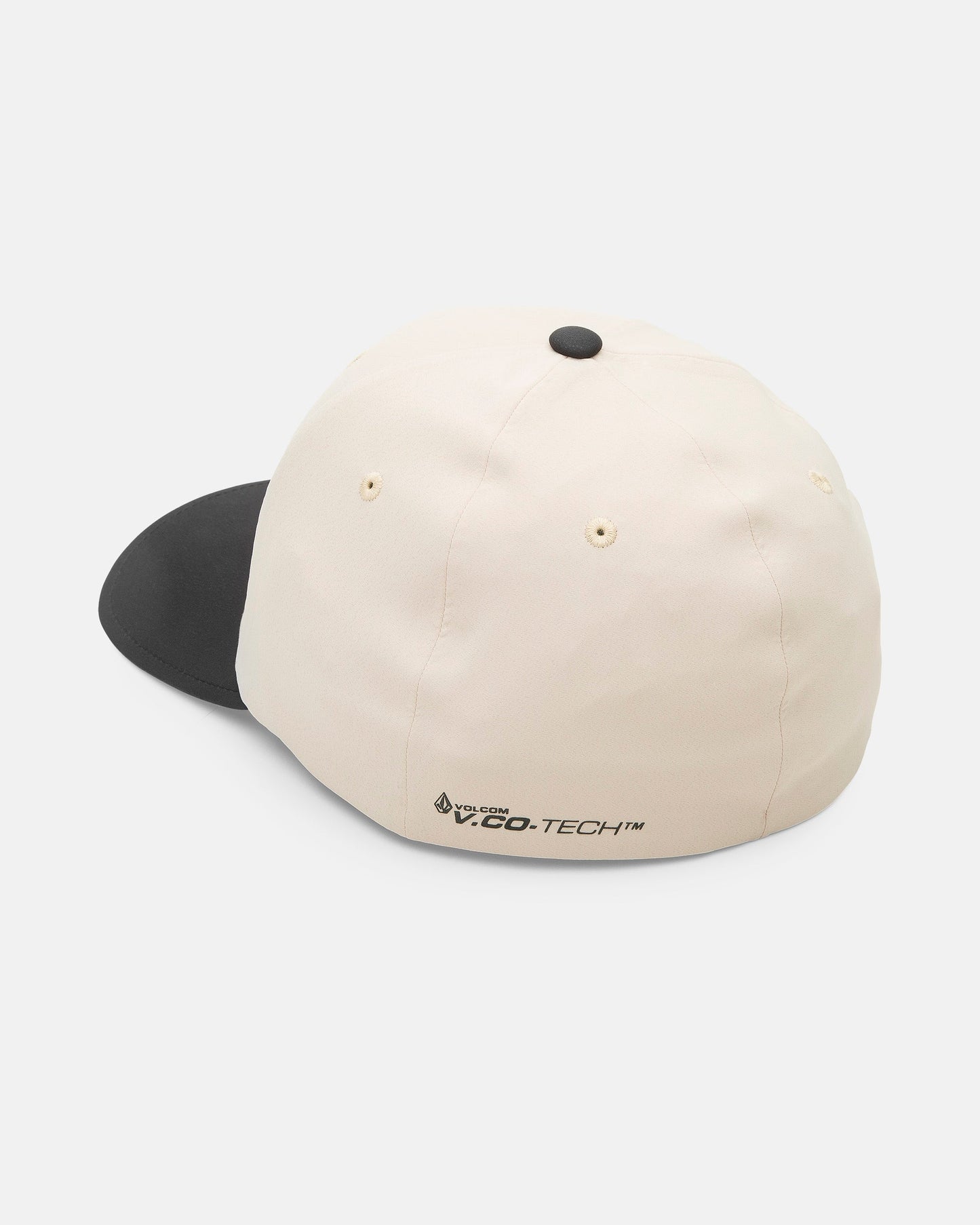 The Volcom Men's Stone Tech Flexfit Delta cap, shown from the back, has a white crown, black brim, small ventilation holes, and logo near the adjustable strap. Made with moisture-wicking fabric for comfort and lasting freshness.