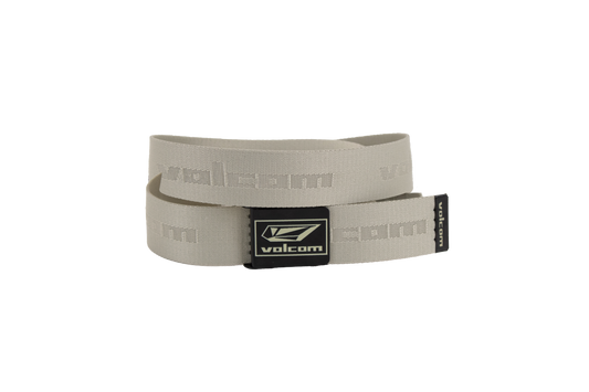The Volcom Men's Modstone Web Belt is a beige belt with a metal clamp buckle featuring the Volcom logo, embossed "volcom" text repeating along the strap, and a hidden opener inside the buckle for added convenience.