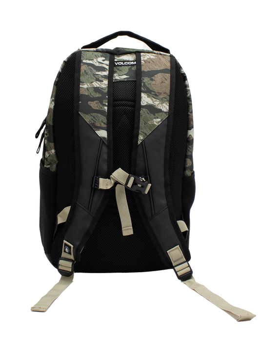 A Men's Grindstone Skate Backpack by Volcom in black, featuring camouflage accents, beige adjustable straps, a chest buckle, and a convenient laptop sleeve, is shown from the back against a white background.