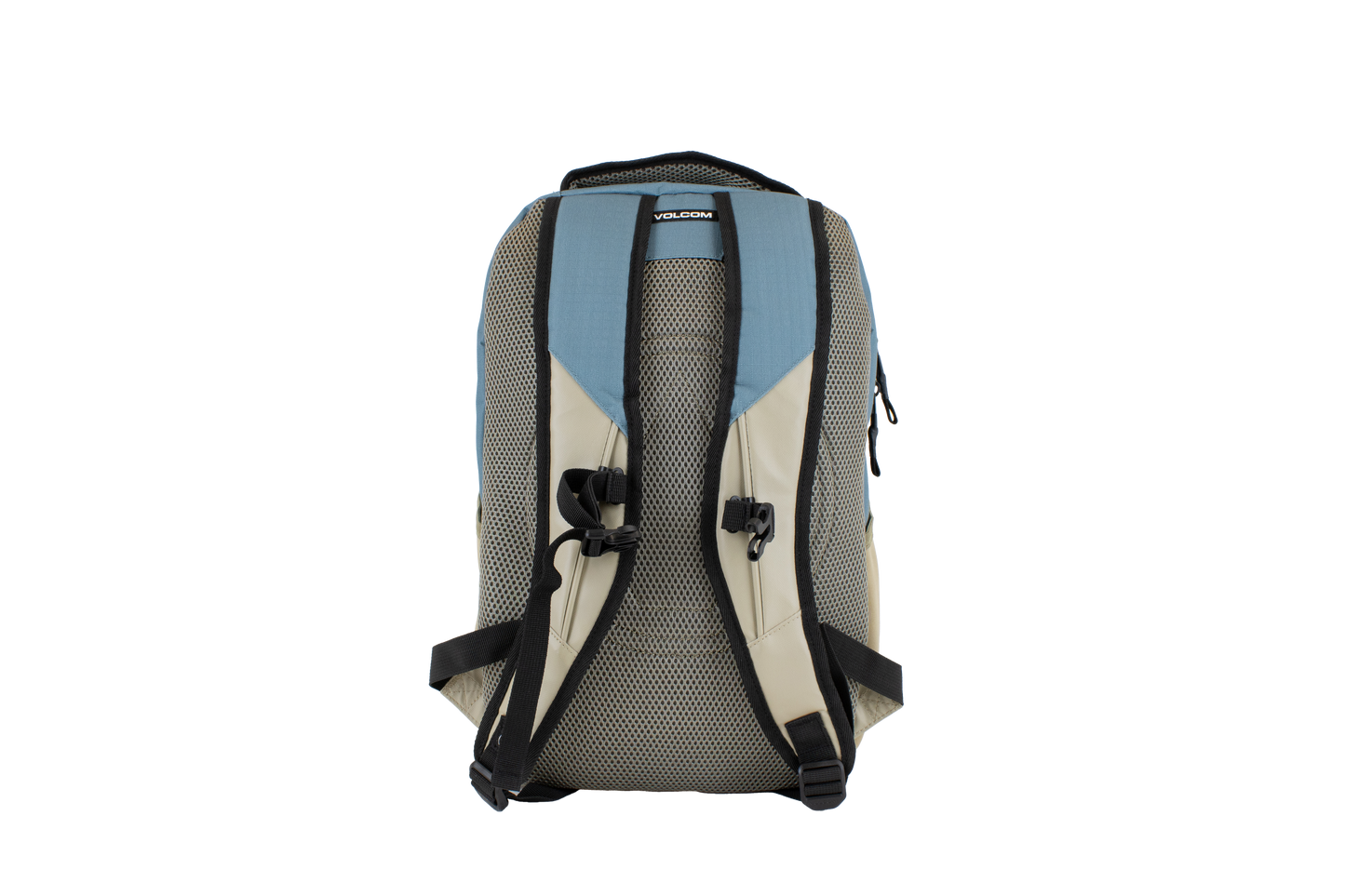 The Volcom Men's Grindstone Skate Backpack in beige and blue is shown from the back, featuring ergonomic black straps with mesh padding for comfort. A sturdy top handle and a visible Volcom brand label are present, and the backpack includes a padded laptop sleeve for added convenience.